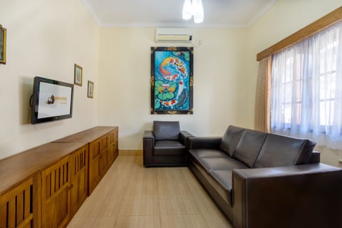 Bungalow with King Bed | Living area | LED TV, DVD player