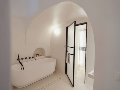 The Collector's Villa with Hot Tub & Caldera View | Bathroom | Rainfall showerhead, designer toiletries, hair dryer, bathrobes