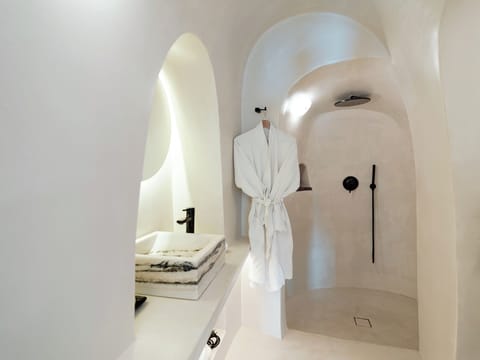 The Alchemist's Maisonette with Hot Tub & Caldera View | Bathroom | Rainfall showerhead, designer toiletries, hair dryer, bathrobes