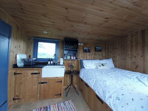 1 bedroom, blackout drapes, bed sheets