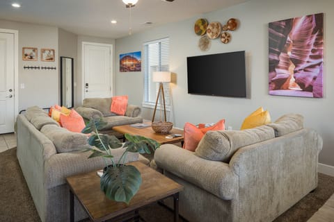 Family Room / Spacious Living Room Area with 55 inch LCD TV