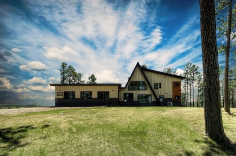 Exterior Front w/ Two Car Garage.
