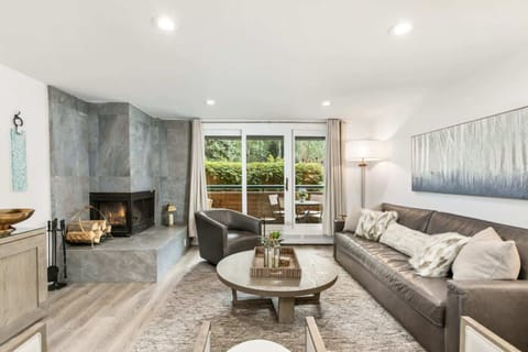 Spacious living room, with fireplace, RH king-size sleeper and heated floors. We also provide firewood for your convenience