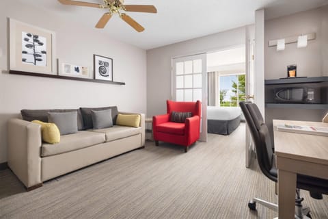 Suite, 1 King Bed, Non Smoking | Blackout drapes, iron/ironing board, free cribs/infant beds