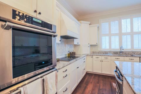The beautifully renovated kitchen is fully stocked for your stay.
