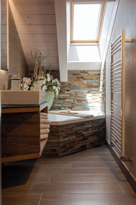 Superior Suite | Down comforters, minibar, in-room safe, individually decorated