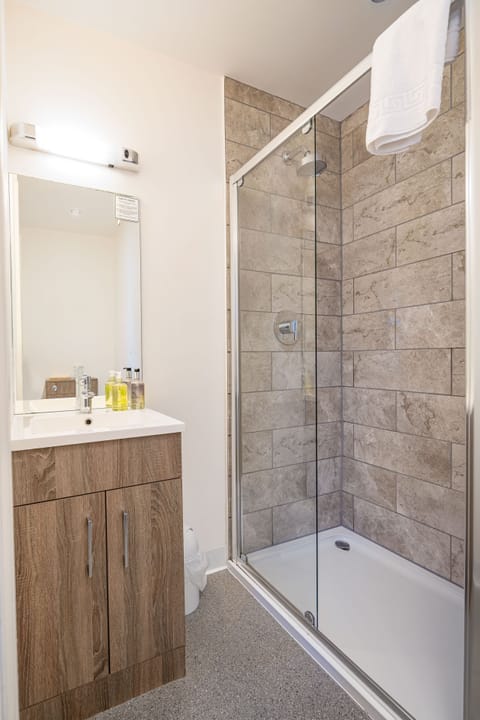 Hair dryer, towels, soap, shampoo