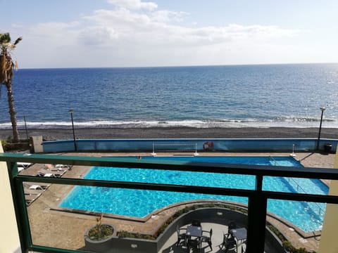 Balcony with Pool & Beach View