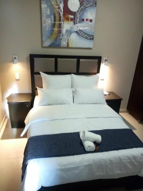 Premium bedding, desk, laptop workspace, free WiFi