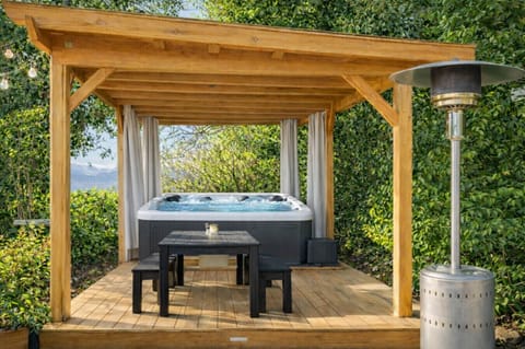 Private Hot tub with outdoor seating for 10