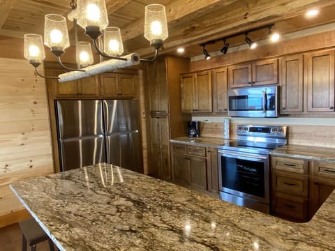 Beautiful custom kitchen. Granite, dual refrigerators. 