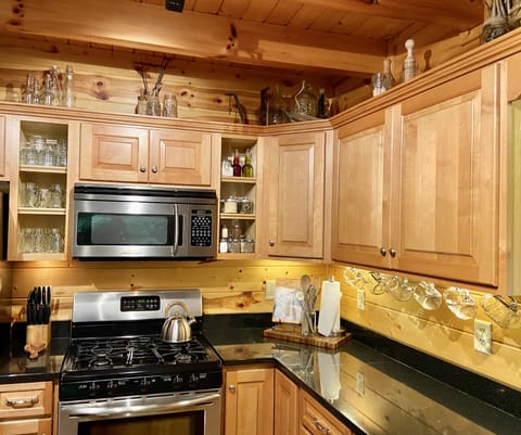 Spacious kitchen w/ everything you need to cook wonderful meals for a big group.