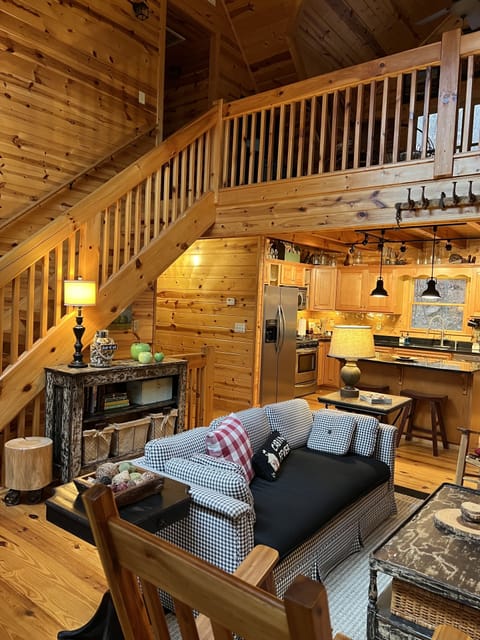 View from main living room up to second floor living room/loft