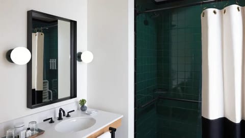 Shower, designer toiletries, hair dryer, bathrobes