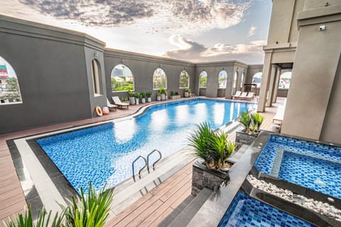 Outdoor pool, open 6:00 AM to 7:00 PM, pool umbrellas, sun loungers