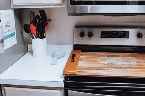 Kitchen stove with noodle board logo, great to
Protect stove and serving tray