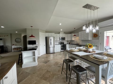 Large kitchen, fully stocked with all of your kitchen needs. 