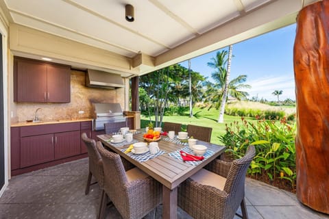 Covered lanai with seating for six and golf course views