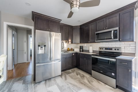Brand new gourmet Kitchen with Quartz countertops