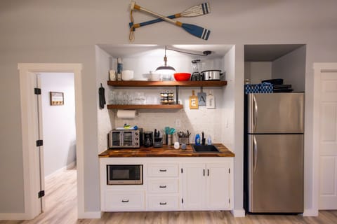 Kitchenette and bathroom entrance
