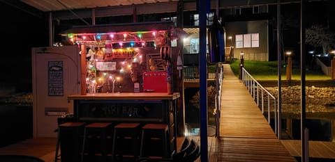 Dock Tiki Bar open slip 2 jet ski slips fish  station/ sink  Frig & shower.