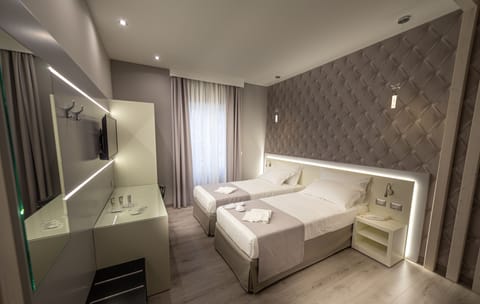 Deluxe Triple Room | Egyptian cotton sheets, premium bedding, down comforters, pillowtop beds