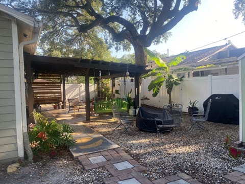 Patio with TV, Weber BBQ gas grill, firepit and more