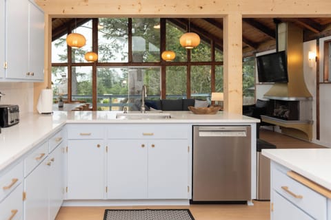 Kitchen complete with stainless steel appliances and a large kitchen island.