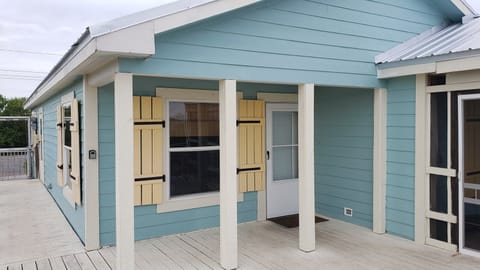 The front porch which faces the lake.