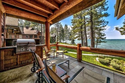 Unwind on your private covered terrace with stunning lake views, complete with BBQ facilities for memorable outdoor dining moments.