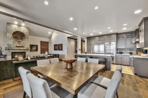 Dining area table with seating for 8 and 3 at the kitchen island