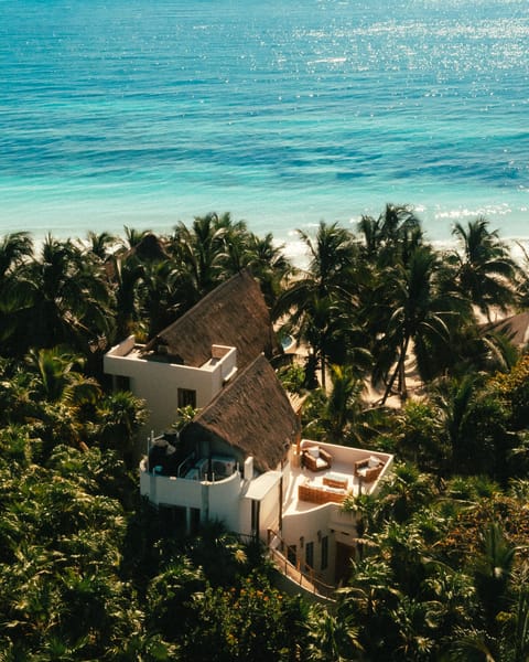 Casa de las Palmas luxury villa on an exclusive beachfront property in Tulum.