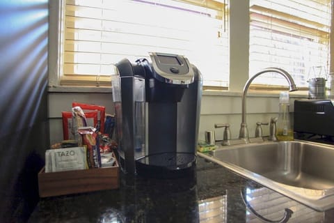 Everything you need, including Kcup coffee and machine, even down to clean sponges for the sink, is provided.