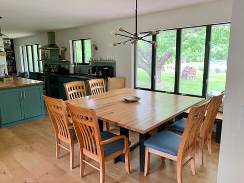 Easy seating for 8-12 at huge table and another 3 at island...