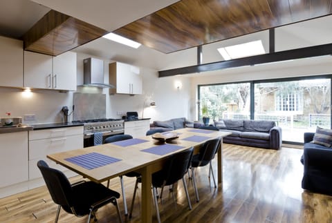 Large kitchen, dining and living room. Table and sofas seat 6. Egham House