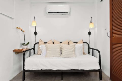 A bed that provides a soothing & airy space to relax at the end of the day