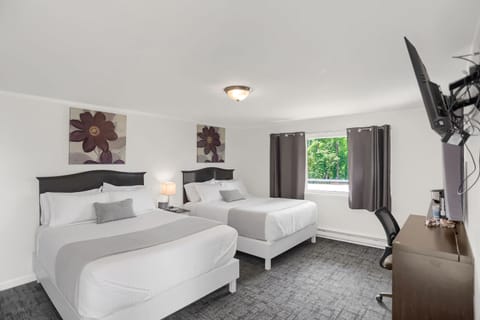 Deluxe Room, 2 Queen Beds | Iron/ironing board, free WiFi, bed sheets
