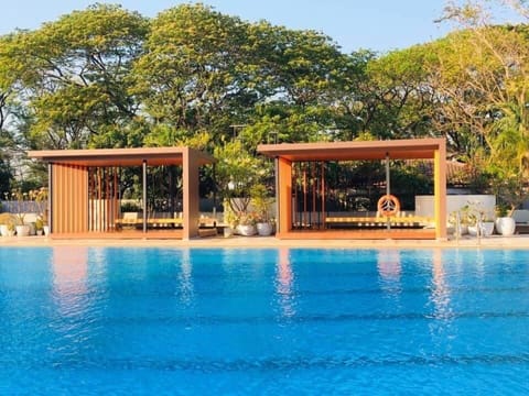 Outdoor pool, open 8:00 AM to 7:00 PM, free cabanas, pool umbrellas