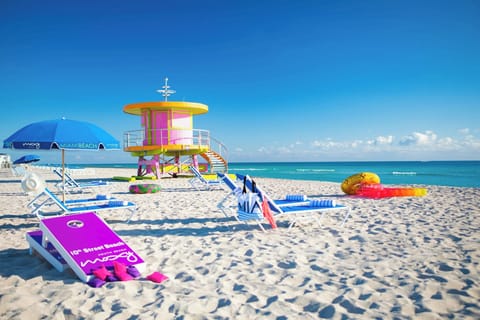 Beach nearby, white sand, sun loungers, beach umbrellas