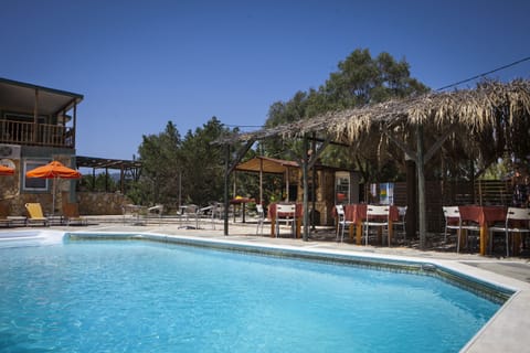 2 outdoor pools, pool umbrellas, sun loungers