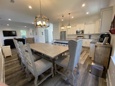 Kitchen/dining area opens into living room offering ample space for entertaining
