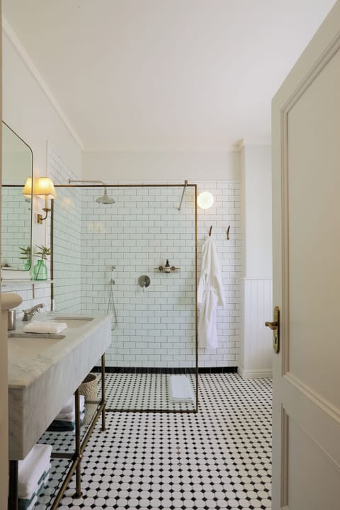 Eco-friendly toiletries, hair dryer, bathrobes, towels