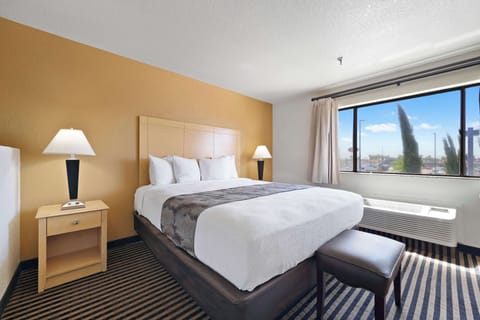 Suite, 1 King Bed, Non Smoking (Oversized Room;with Sofabed) | Premium bedding, in-room safe, laptop workspace, blackout drapes