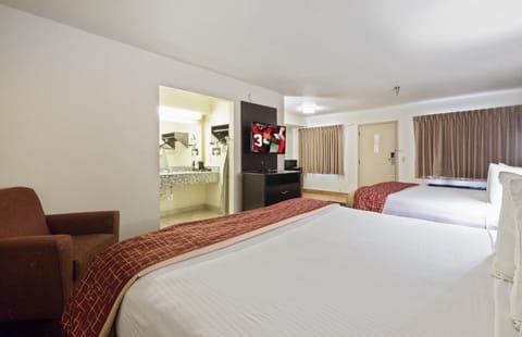 Desk, laptop workspace, blackout drapes, iron/ironing board