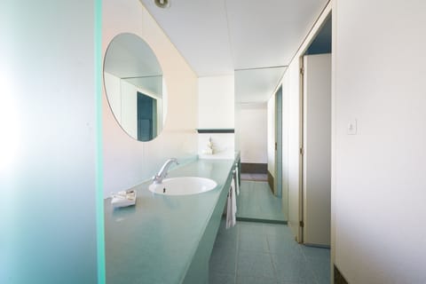 Triple Room (Room Selected at Check-In) | Bathroom | Eco-friendly toiletries, hair dryer, towels, soap