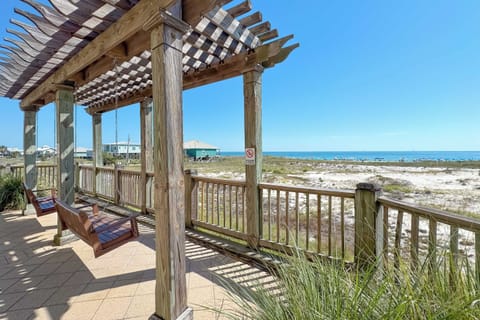Elegantly designed for leisure. This shaded swing area offers the perfect blend of comfort and scenic beauty.