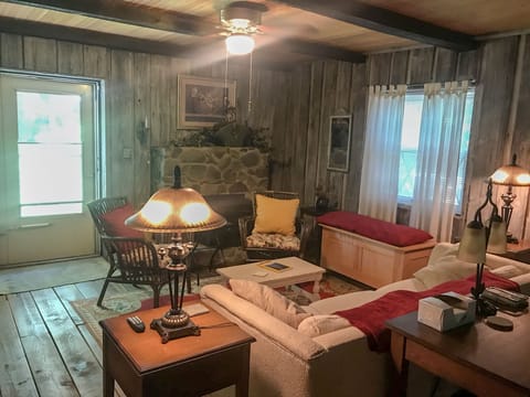 Studio apartment.  Walls are reclaimed barn wood and floors are pine