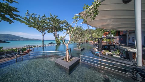Outdoor pool, open 7:00 AM to 7:00 PM, sun loungers