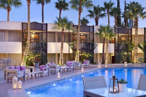 Indoor pool, seasonal outdoor pool, pool umbrellas, sun loungers