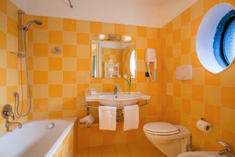 Deep soaking tub, rainfall showerhead, free toiletries, hair dryer